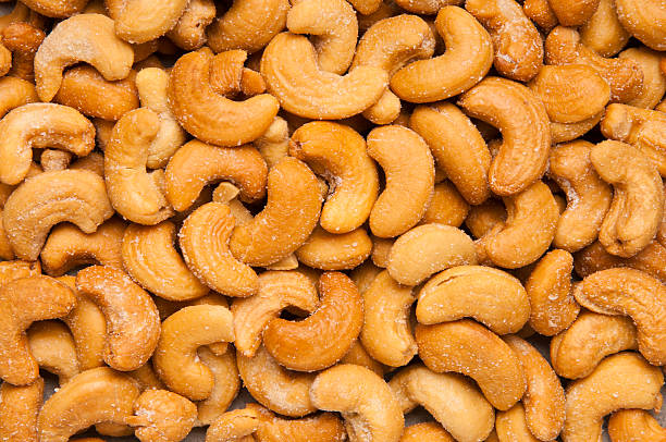 Salted and spiced cashew nuts — lightly salted, classic salted and Indian spiced variants